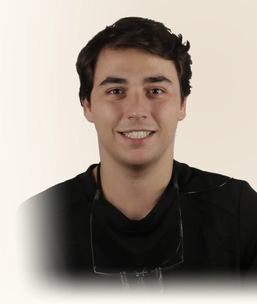 Dr. Álvaro Babiano Nodal, CHC portrait in black scrubs.